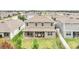 Aerial view of two story house, backyard and neighborhood at 936 Jetway Street, Orange City, FL 32763