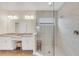 Bathroom with double vanity, walk-in shower, and tile floors at 936 Jetway Street, Orange City, FL 32763