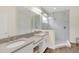 Elegant bathroom with double vanity and walk-in shower at 936 Jetway Street, Orange City, FL 32763