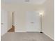 Bright bedroom with double doors leading to another room at 936 Jetway Street, Orange City, FL 32763
