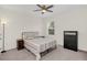 Spacious bedroom with ceiling fan, dresser, and window at 936 Jetway Street, Orange City, FL 32763