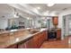 Modern kitchen with stainless steel appliances at 9908 Fairway Cir, Leesburg, FL 34788