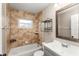 Bathroom with a shower-tub combination and a gray vanity with a white countertop and decorative mirror at 102 Aberdeen Dr, Fern Park, FL 32730