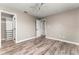 Spacious bedroom featuring wood-look tile, fan and large closet for maximum storage at 102 Aberdeen Dr, Fern Park, FL 32730