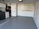 Garage with washer, dryer, and storage shelves at 102 Aberdeen Dr, Fern Park, FL 32730