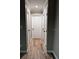 Hallway with doors to bedrooms and bathrooms at 102 Aberdeen Dr, Fern Park, FL 32730