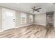 Bright living room featuring modern flooring, neutral paint, generous natural light, and a welcoming ambiance at 102 Aberdeen Dr, Fern Park, FL 32730