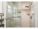 Beautiful glass shower with a rainfall shower head, tiled walls, and modern fixtures at 102 Aberdeen Dr, Fern Park, FL 32730