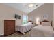 Welcoming bedroom with twin beds and a TV at 1037 Balmoral Dr, Davenport, FL 33896