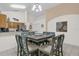 Dining area features a square table and six chairs at 1037 Balmoral Dr, Davenport, FL 33896