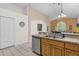 Kitchen with stainless steel dishwasher and double sink at 1037 Balmoral Dr, Davenport, FL 33896