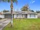 Updated single-story home with solar panels and landscaped lawn at 1113 Matterhorn Street, Deltona, FL 32725