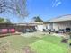 Relaxing patio area with seating and a custom bar at 1113 Matterhorn Street, Deltona, FL 32725