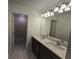 Double vanity bathroom with quartz countertop at 1200 Happy Forest Loop, Deland, FL 32720