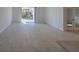 Spacious living room with sliding glass doors to backyard at 1200 Happy Forest Loop, Deland, FL 32720