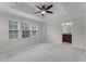 Spacious bedroom with en-suite bathroom and ample natural light at 1267 Marley Ln, Winter Springs, FL 32708