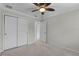 Bedroom with double door closet and ceiling fan at 1267 Marley Ln, Winter Springs, FL 32708