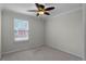 Bright bedroom featuring a window with blinds at 1267 Marley Ln, Winter Springs, FL 32708