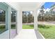 Covered patio with sliding glass doors and a view of the backyard at 12707 Sw 78Th Pl, Dunnellon, FL 34432