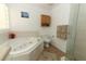 Bathroom featuring a jacuzzi tub with tile surround, a shower, and modern fixtures at 1369 Black Willow Trl, Altamonte Springs, FL 32714