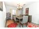 Bright dining area with modern chandelier and adjacent breakfast nook at 1369 Black Willow Trl, Altamonte Springs, FL 32714