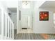 Bright foyer with tile floors transitioning to wood and high ceilings at 1369 Black Willow Trl, Altamonte Springs, FL 32714