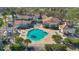 Community pool with surrounding lounge areas at 13839 Fairway Island Dr # 1122, Orlando, FL 32837