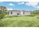 New home with large backyard and grassy area at 14 Fisher Loop Pass, Ocklawaha, FL 32179