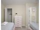 Bedroom with two twin beds and a shared closet at 1498 Moon Valley Dr, Davenport, FL 33896