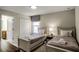 Bedroom with two twin beds, and en-suite bathroom at 1498 Moon Valley Dr, Davenport, FL 33896