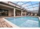 Relaxing pool area with patio and plenty of space for entertaining at 1498 Moon Valley Dr, Davenport, FL 33896