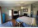 Spacious bedroom with wood floors and a ceiling fan at 17901 Coralwood Ln, Groveland, FL 34736