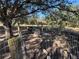Wooden chicken coop with a run enclosed by a wire fence at 17901 Coralwood Ln, Groveland, FL 34736
