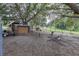 Chicken coop with many chickens, plus play area with slide and swings at 17901 Coralwood Ln, Groveland, FL 34736