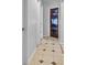 Hallway with tiled flooring and decorative stained glass door at 17901 Coralwood Ln, Groveland, FL 34736