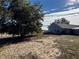 View of a house exterior from the backyard at 17901 Coralwood Ln, Groveland, FL 34736