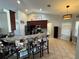 Updated kitchen featuring granite countertops, and stainless steel appliances at 17901 Coralwood Ln, Groveland, FL 34736