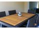 Wooden patio table with six chairs at 2182 Fleming Mist Pl, Kissimmee, FL 34747