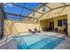 Private screened pool and patio furniture at 2182 Fleming Mist Pl, Kissimmee, FL 34747