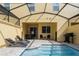 Private screened pool and patio area at 2182 Fleming Mist Pl, Kissimmee, FL 34747