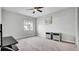 Spacious bedroom with window and ceiling fan at 2305 Leeward Cv, Kissimmee, FL 34746