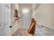 This spacious walk-in closet has ample storage with multiple shelves and hanging rods at 2305 Leeward Cv, Kissimmee, FL 34746