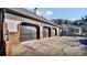 Spacious three car garage providing ample parking and storage at 2305 Leeward Cv, Kissimmee, FL 34746