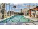 Inviting screened-in pool with tile accents and ample space for lounging and entertaining at 2305 Leeward Cv, Kissimmee, FL 34746