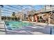 Enjoy this screened-in pool with an outdoor kitchen, perfect for entertaining at 2305 Leeward Cv, Kissimmee, FL 34746