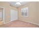 Bedroom with double door closet and window at 24728 Calusa Blvd, Eustis, FL 32736