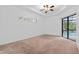 Bright bedroom with pool view and sliding glass doors at 24728 Calusa Blvd, Eustis, FL 32736