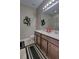 Shared bathroom with double vanity and tile flooring at 2518 Hayden Valley St, Apopka, FL 32703