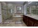 Bathroom boasts double vanity, soaking tub, and shower at 2518 Hayden Valley St, Apopka, FL 32703