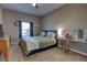 Bedroom with a queen-size bed and vanity area at 2518 Hayden Valley St, Apopka, FL 32703